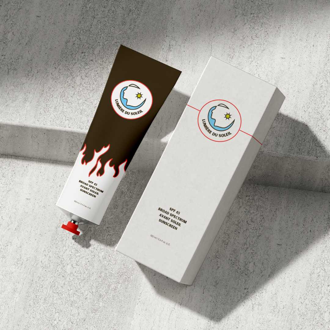 Packaging mockup of Lumière Du Soleil sunscreen against a concrete background.
